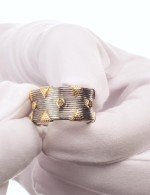 Кольцо из серебра 925 пробы и золота 750 пробы c рубином