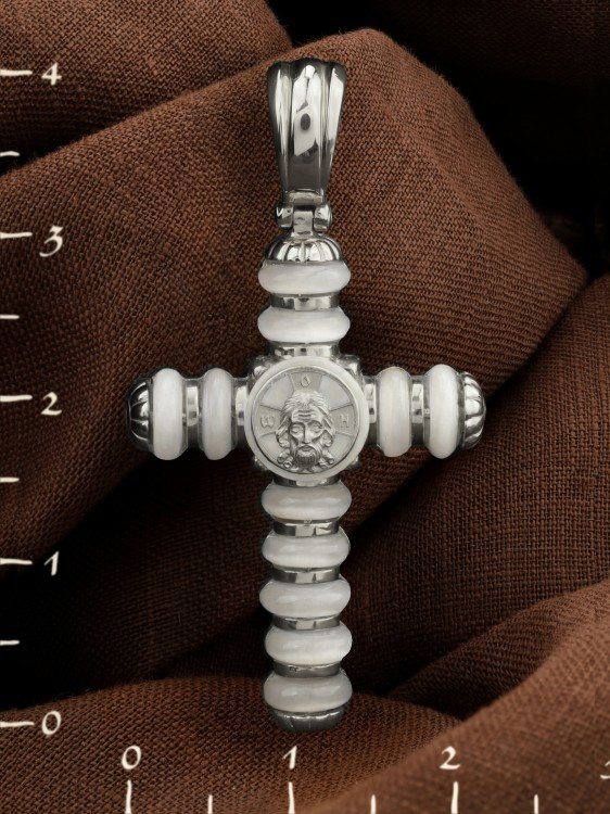 Крест из белого золота c кахолонгом