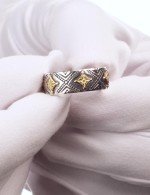 Кольцо из серебра 925 пробы и золота 750 пробы c рубином