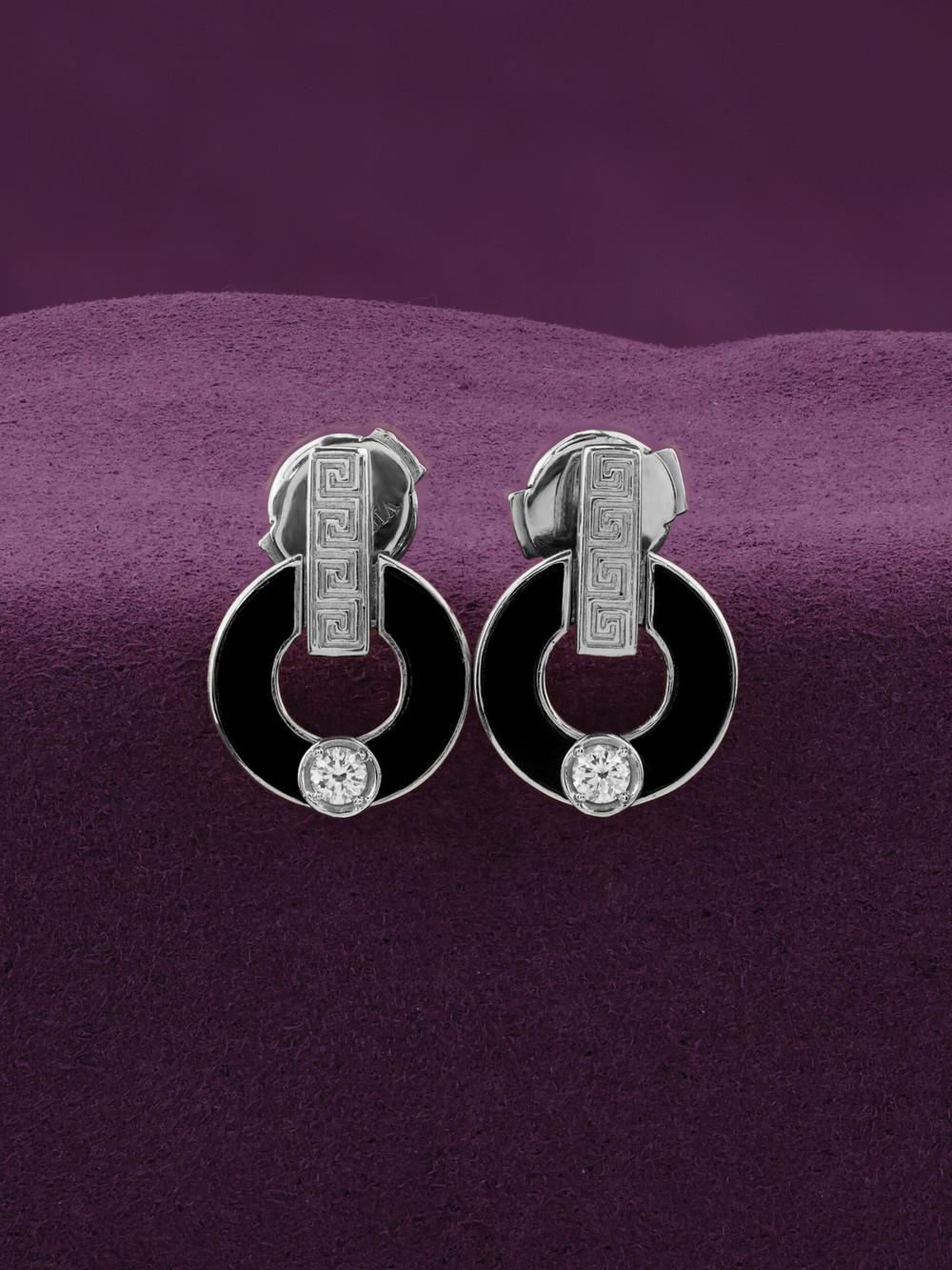 Серьги из белого золота c бриллиантами и ониксом