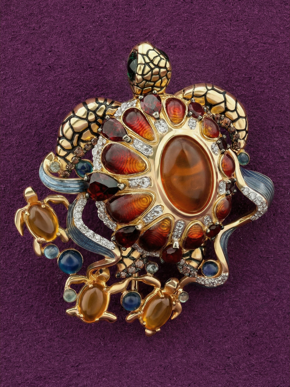 Брошь из лимонного золота c эмаль , фианитом, гранатом и янтарём